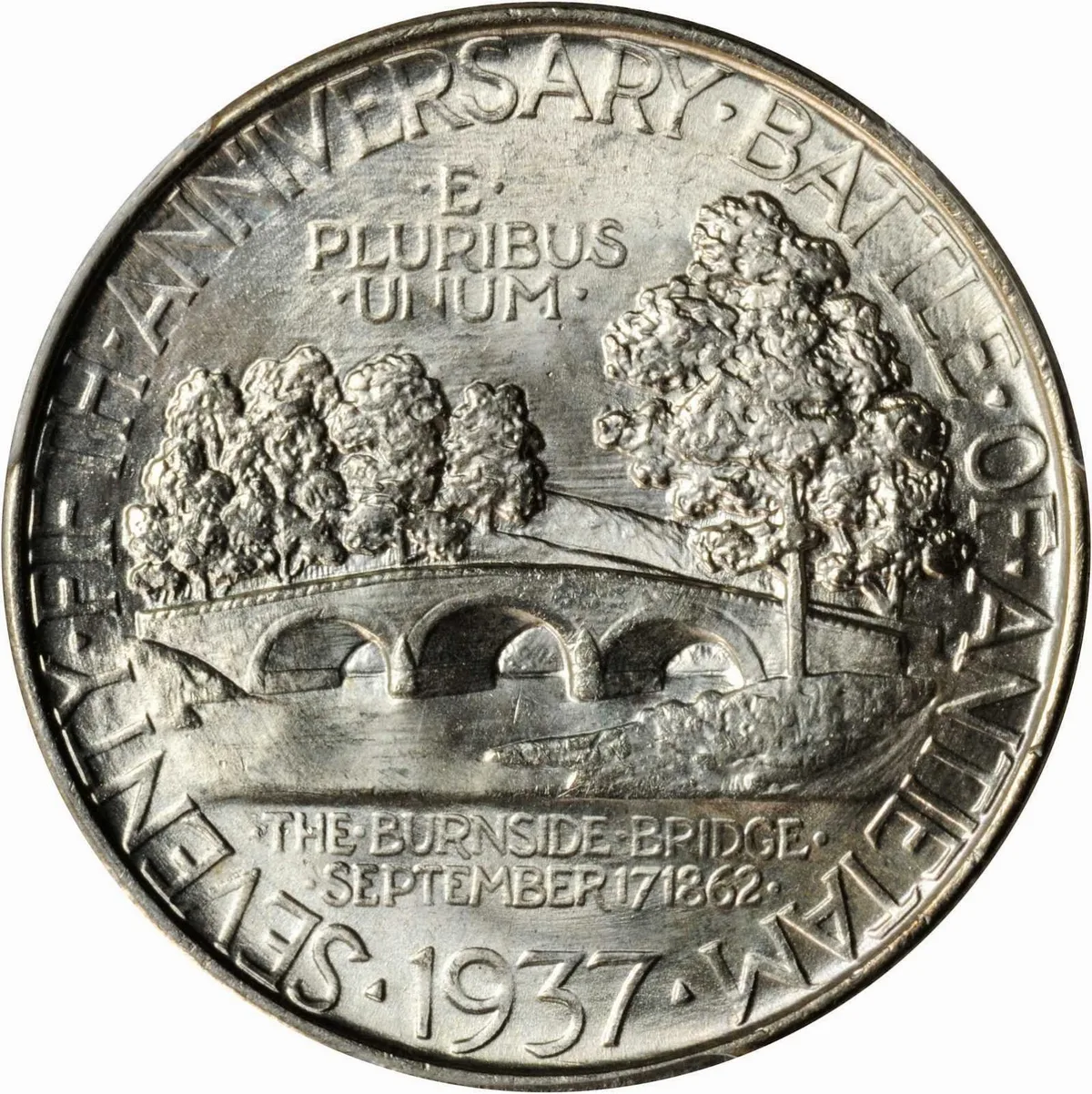 A close-up of a silver commemorative half dollar shows Burnside Bridge at Antietam, with three stone arches spanning the water and trees rising behind it. Raised lettering circles the coin, including “FANNY BATTFIELD” and “THE BURNSIDE BRIDGE SEPTEMBER 17, 1862,” with the date 1937 at the bottom.