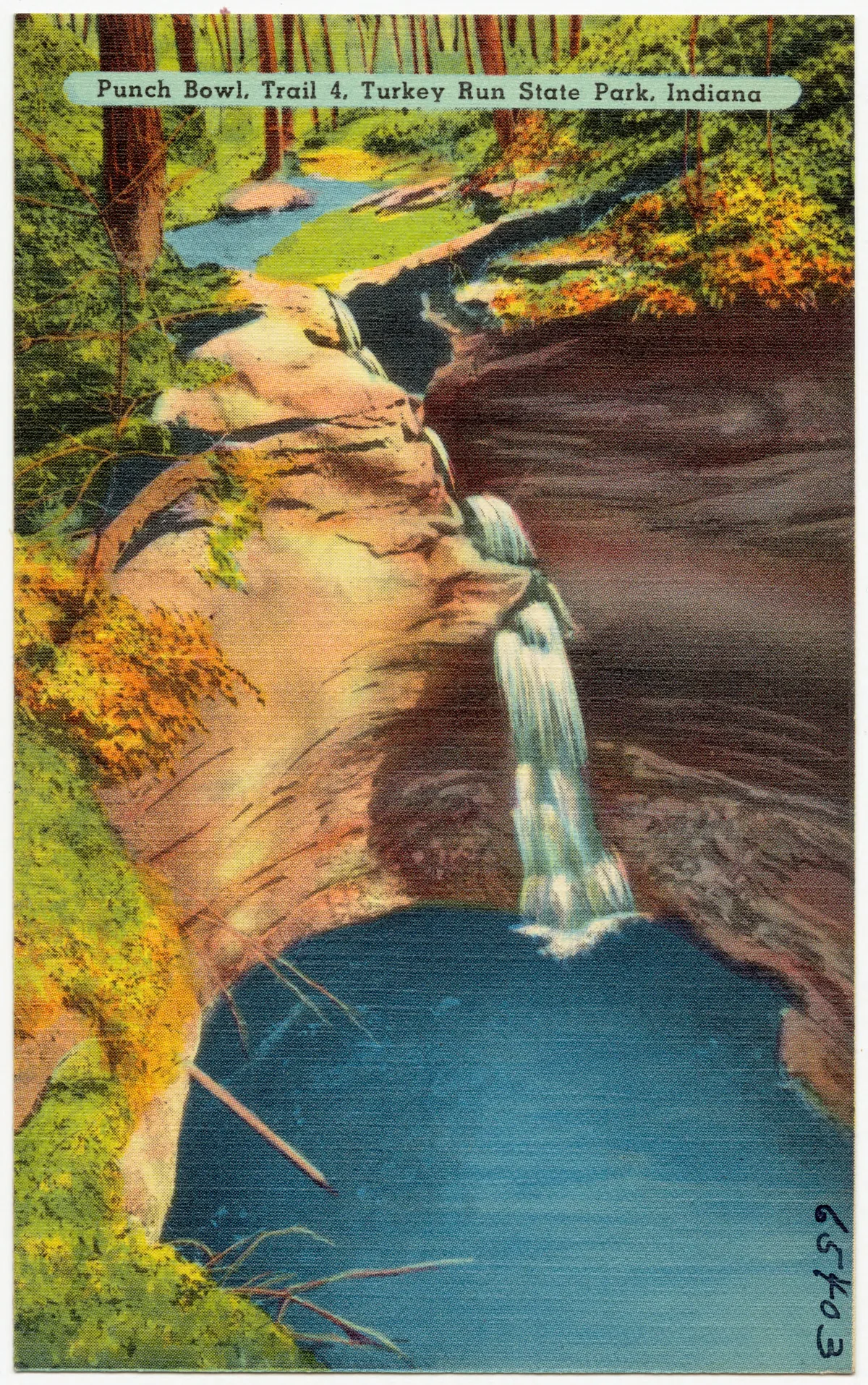 A steep bluff overlooks a narrow blue inlet where water spills over smooth rock into a deep pool, framed by dense green forest and warm golden light. The scene feels secluded and rugged, with layered sandstone and a small waterfall cutting through the wooded gorge.
